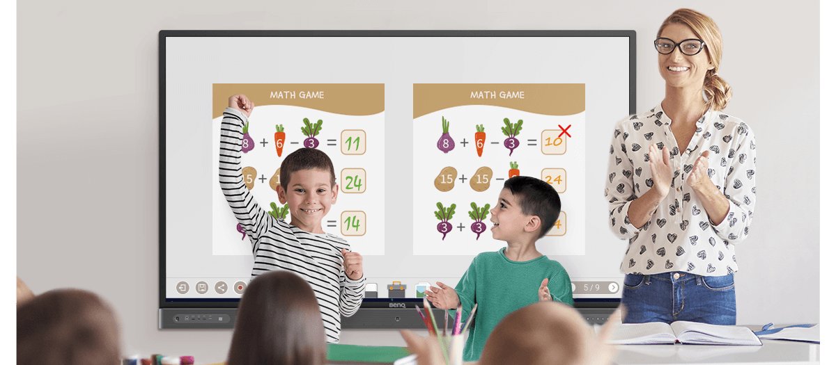 Two students playing a maths game on interactive display